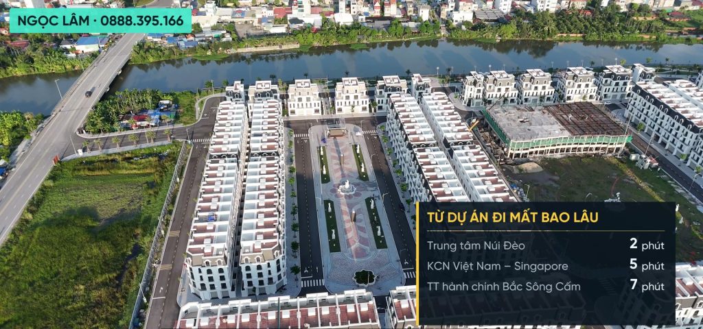 Toàn cảnh khu đô thị Hoàng Huy Green River nhìn từ flycam tháng 10 năm 2026, các dãy liền kề trắng mái đỏ nằm giữa sông Hòn Ngọc và trục đường 9C